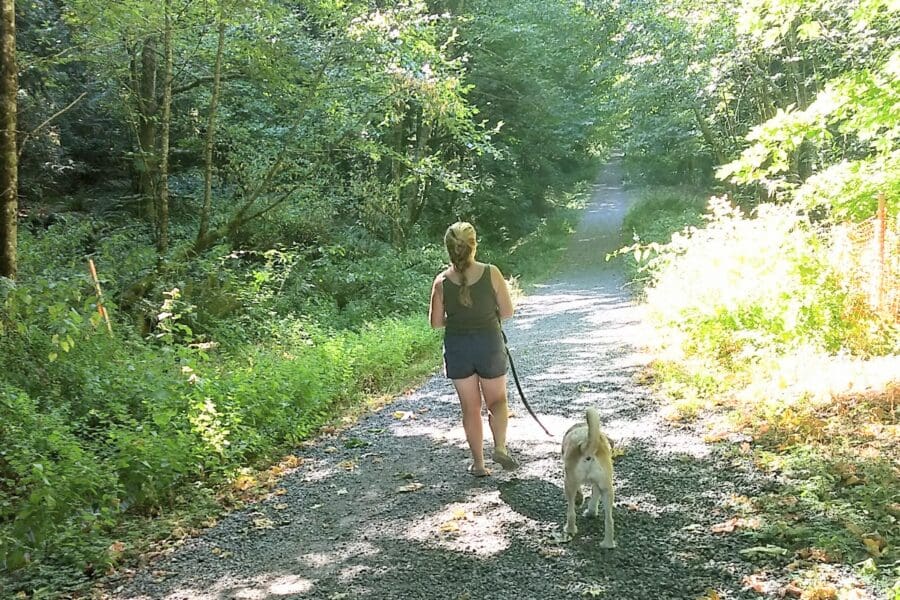 A photo of treasure and Allison walking - a story about pet love and pet loss.
