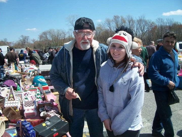Navigating the loss of her father, sharing his memories and showing a picture of them together at an antique market.